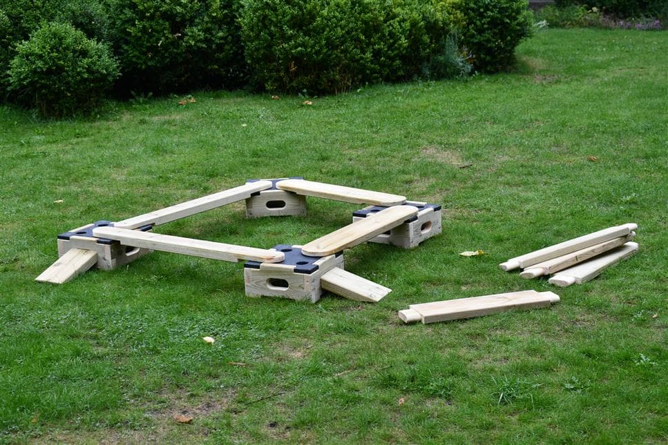 A side view of the apprentice play builder