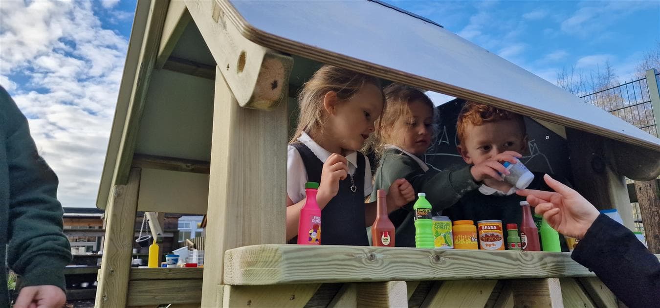 Small playhouse for outdoor playground settings