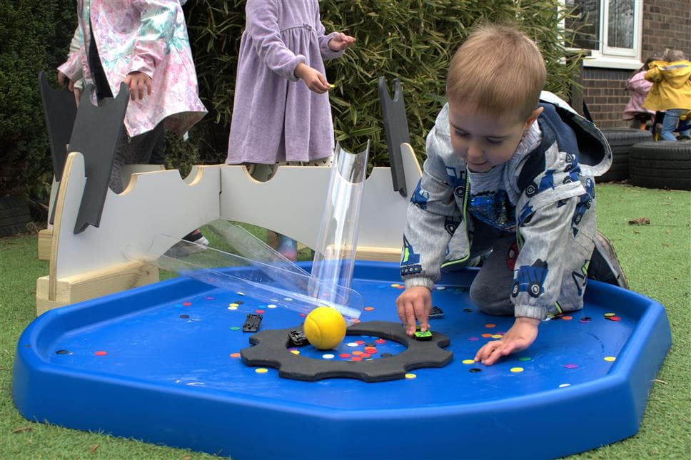 Outdoor playground tuff spot tray for low cost budgets
