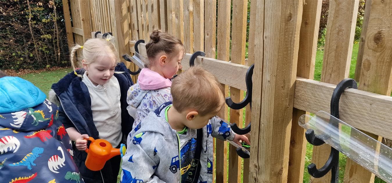 outdoor water channel hooks hat go on fencing in schools