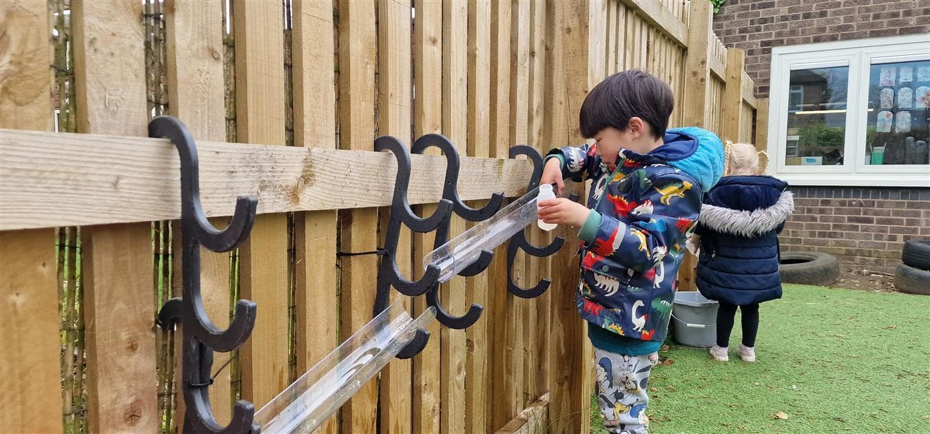 Attachable water wall hooks for fences