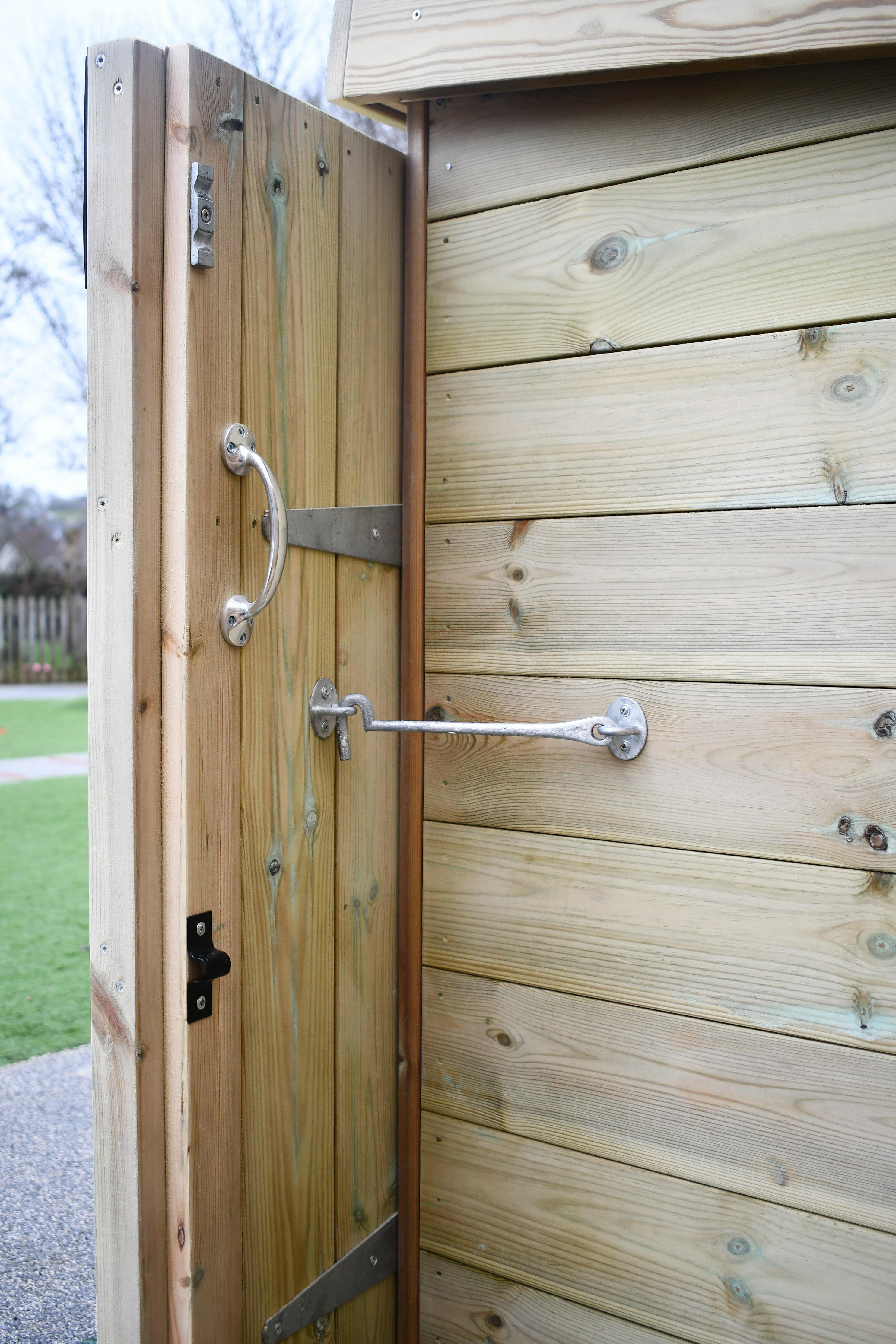 An open wooden Acorn Self Select Storage unit with safety hinge