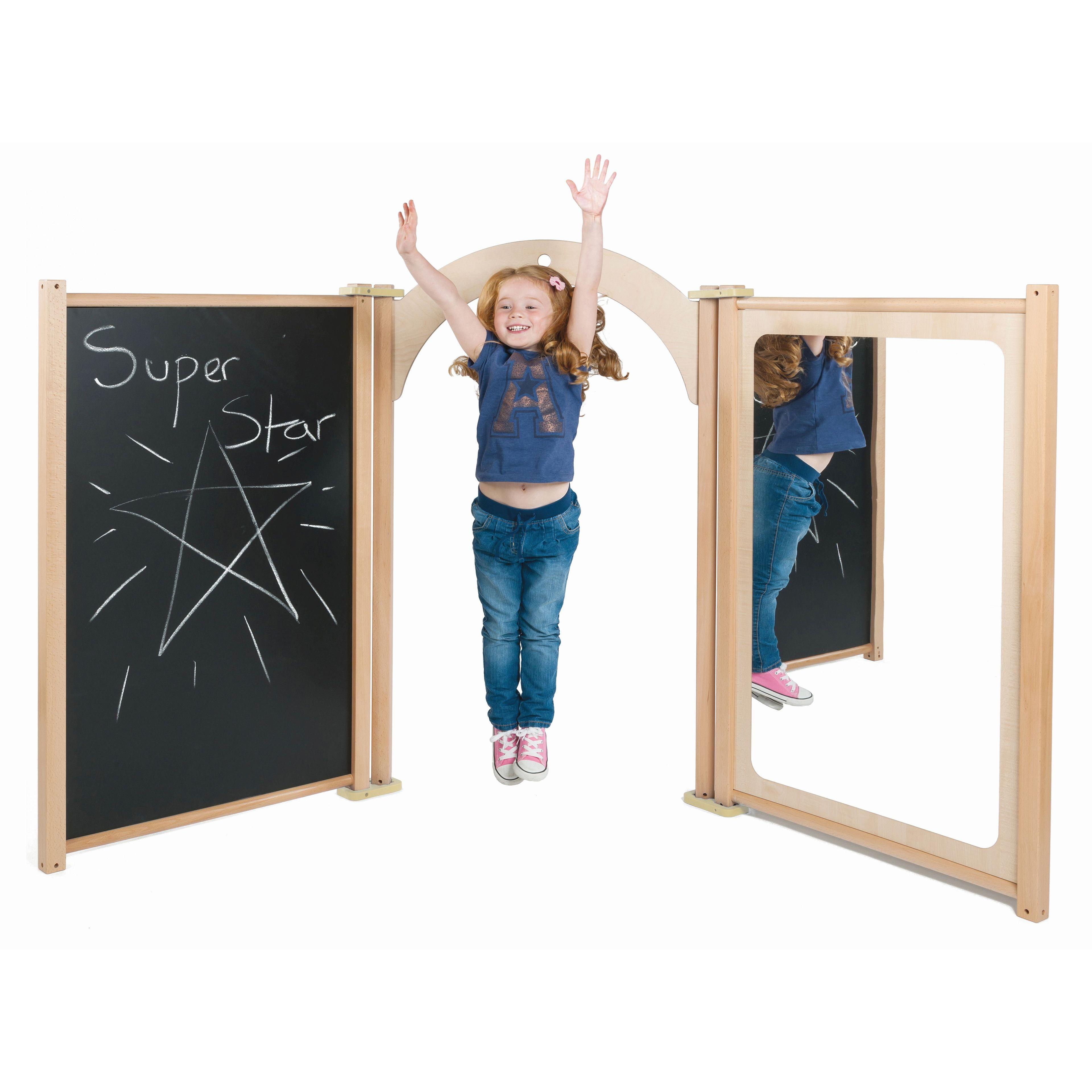 A young girl is jumping in the air, she is playing with the Mapel Panel Drama Set, on a white background. 