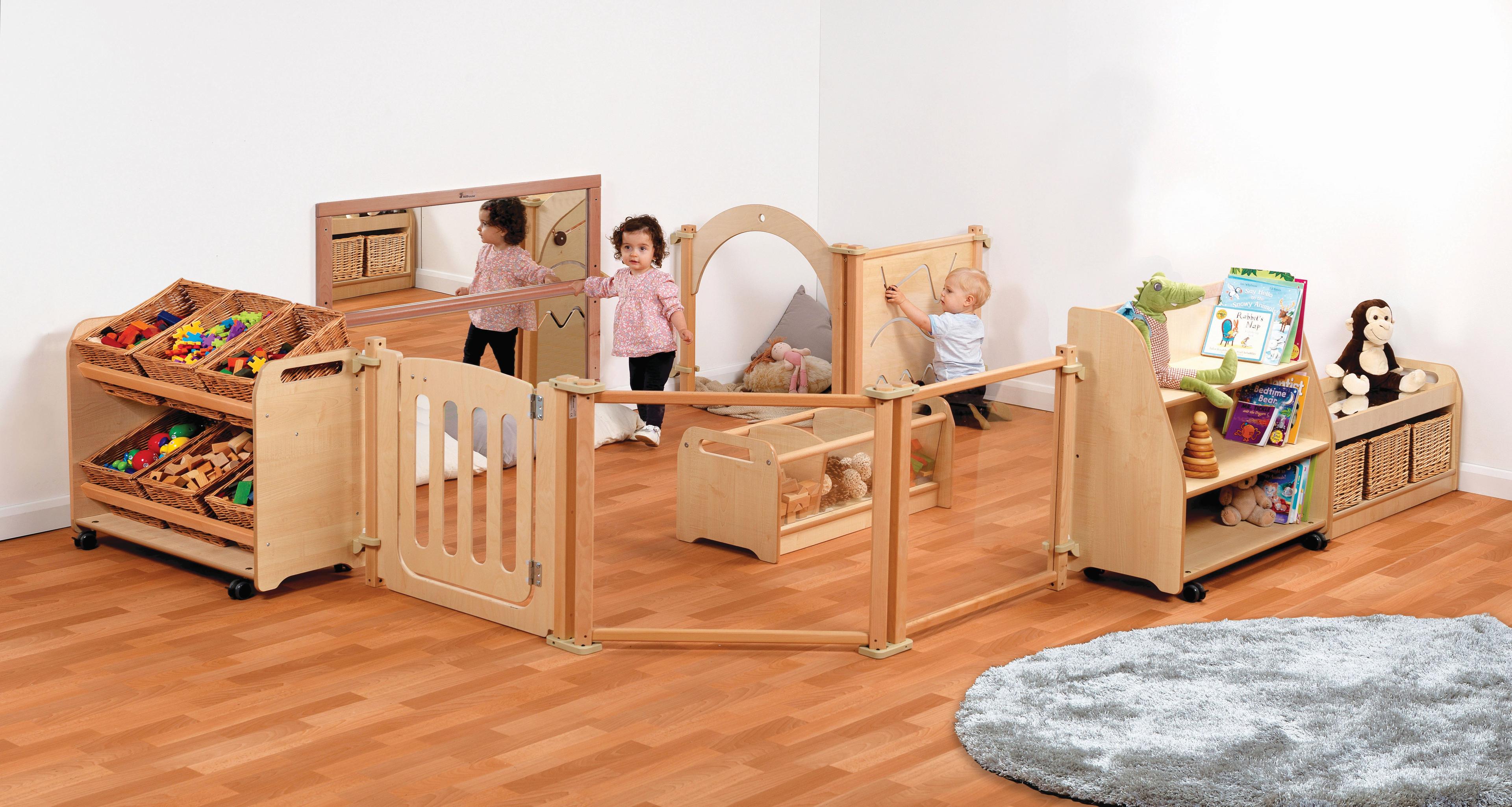 Two babbies are playing inside the Baby Zone with Large Baskets.   