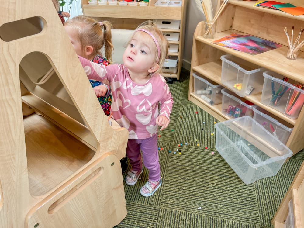 Little girl with Millhouse Art Easel