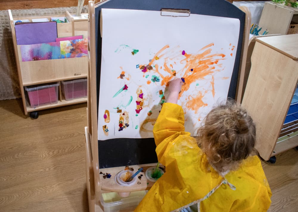 Child drawing with Millhouse Art Easel