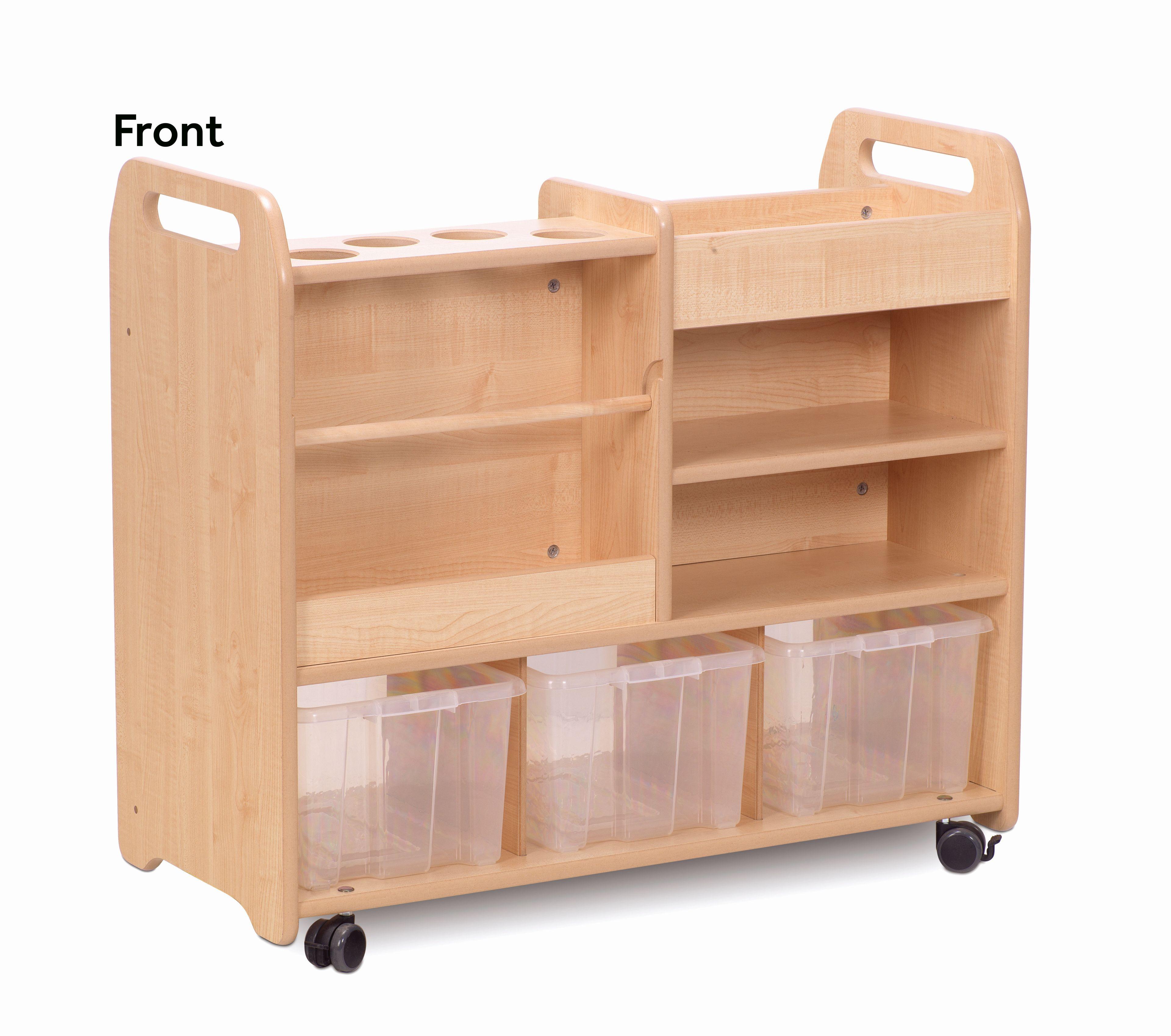 A young girl is choosing arts and crafts supplies from the Double-sided Creative Unit.
