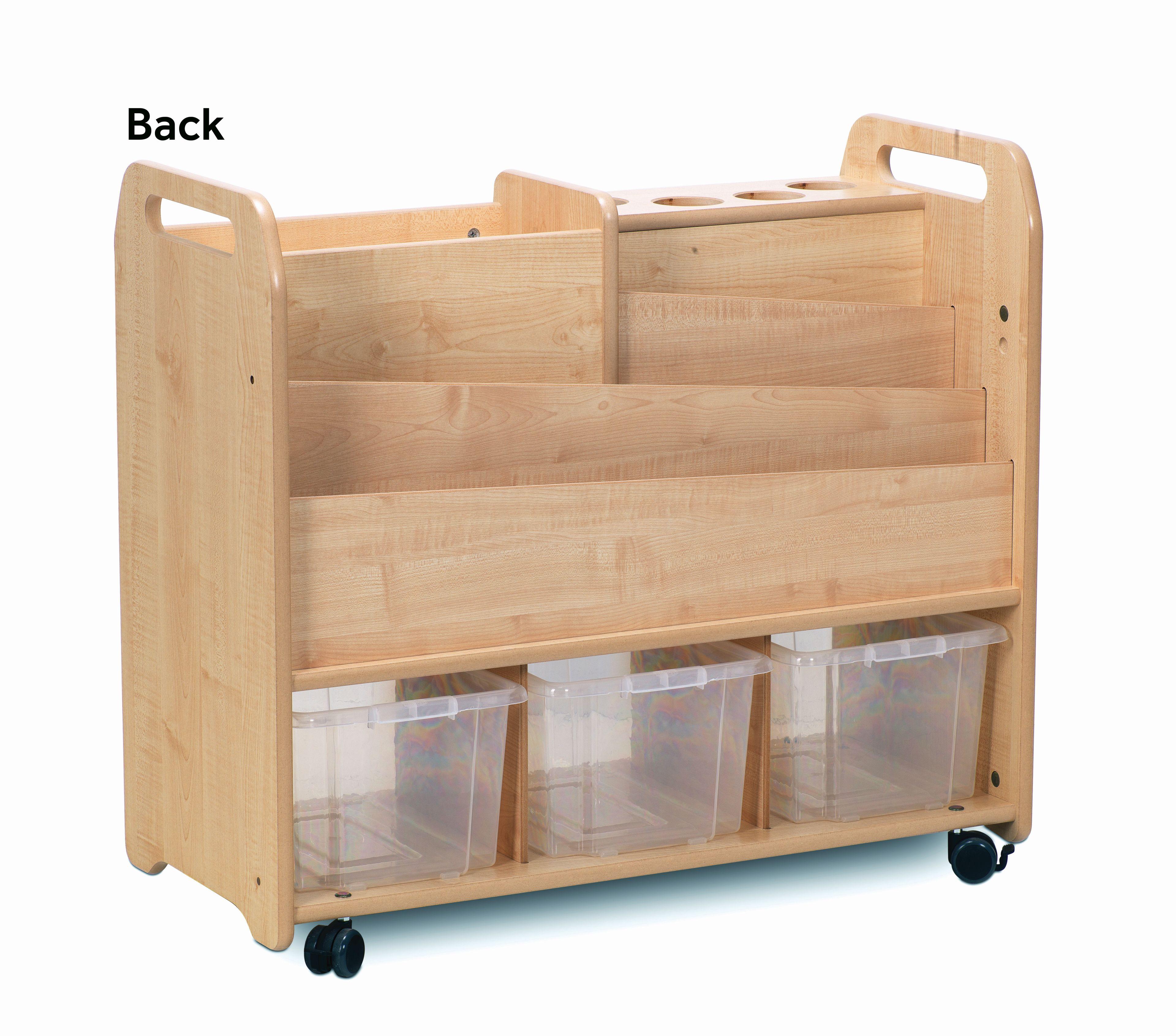 A young girl is choosing arts and crafts supplies from the Double-sided Creative Unit.