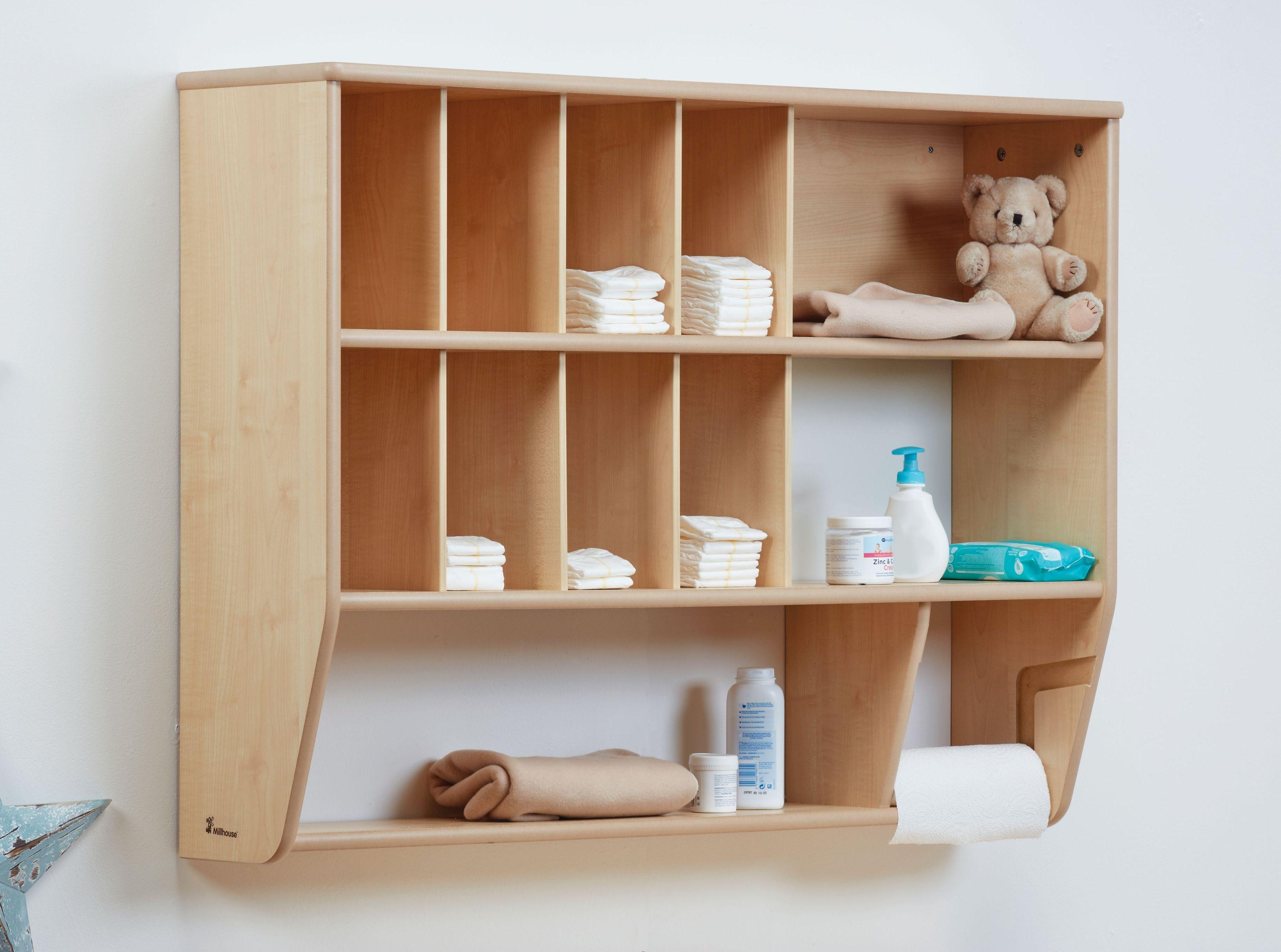 The Baby Changing Wall Storage Unit has various items stored on it. 