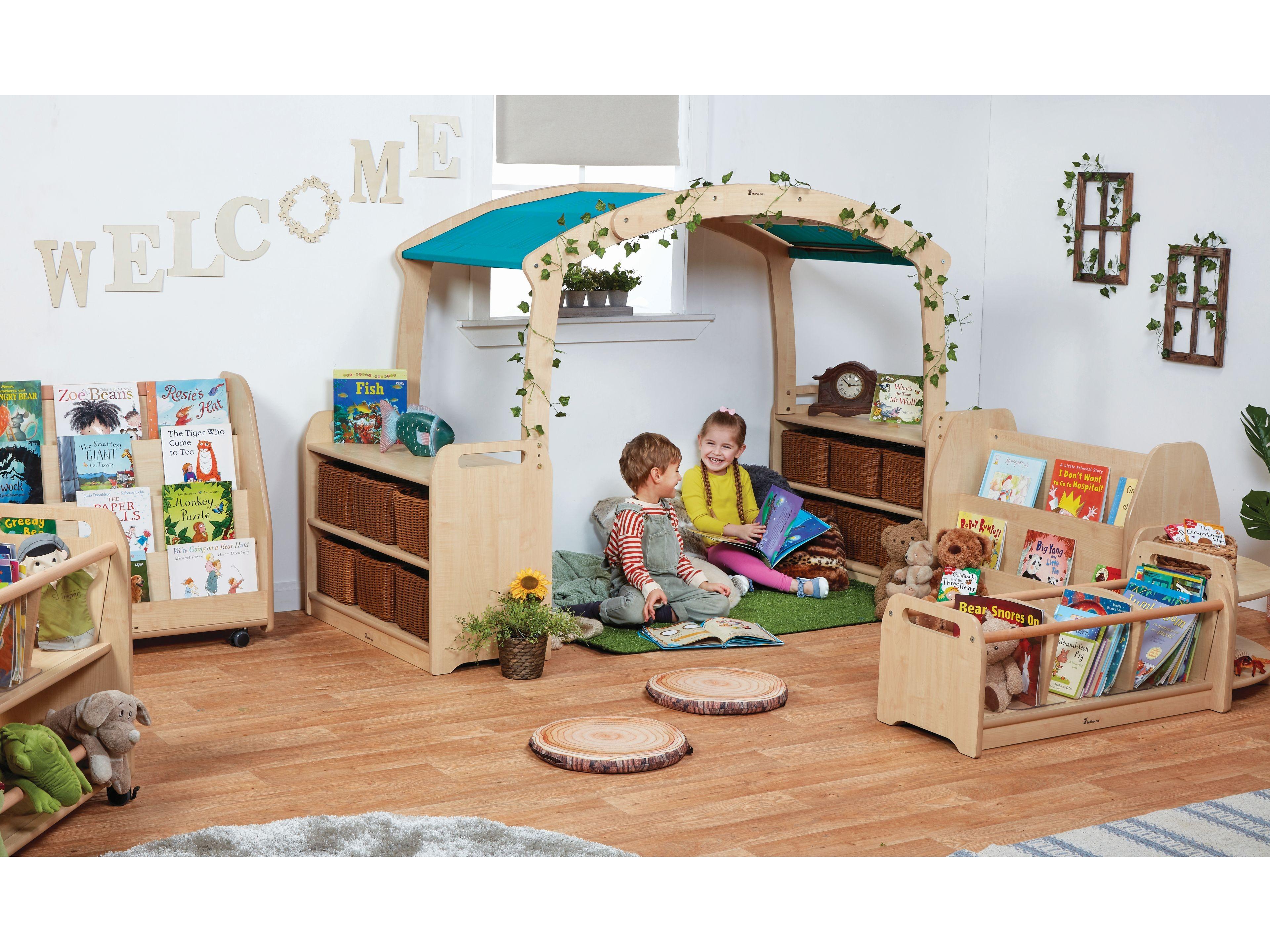 millhouse woodland reading den in a cosy zone with storage, books and wooden log seats