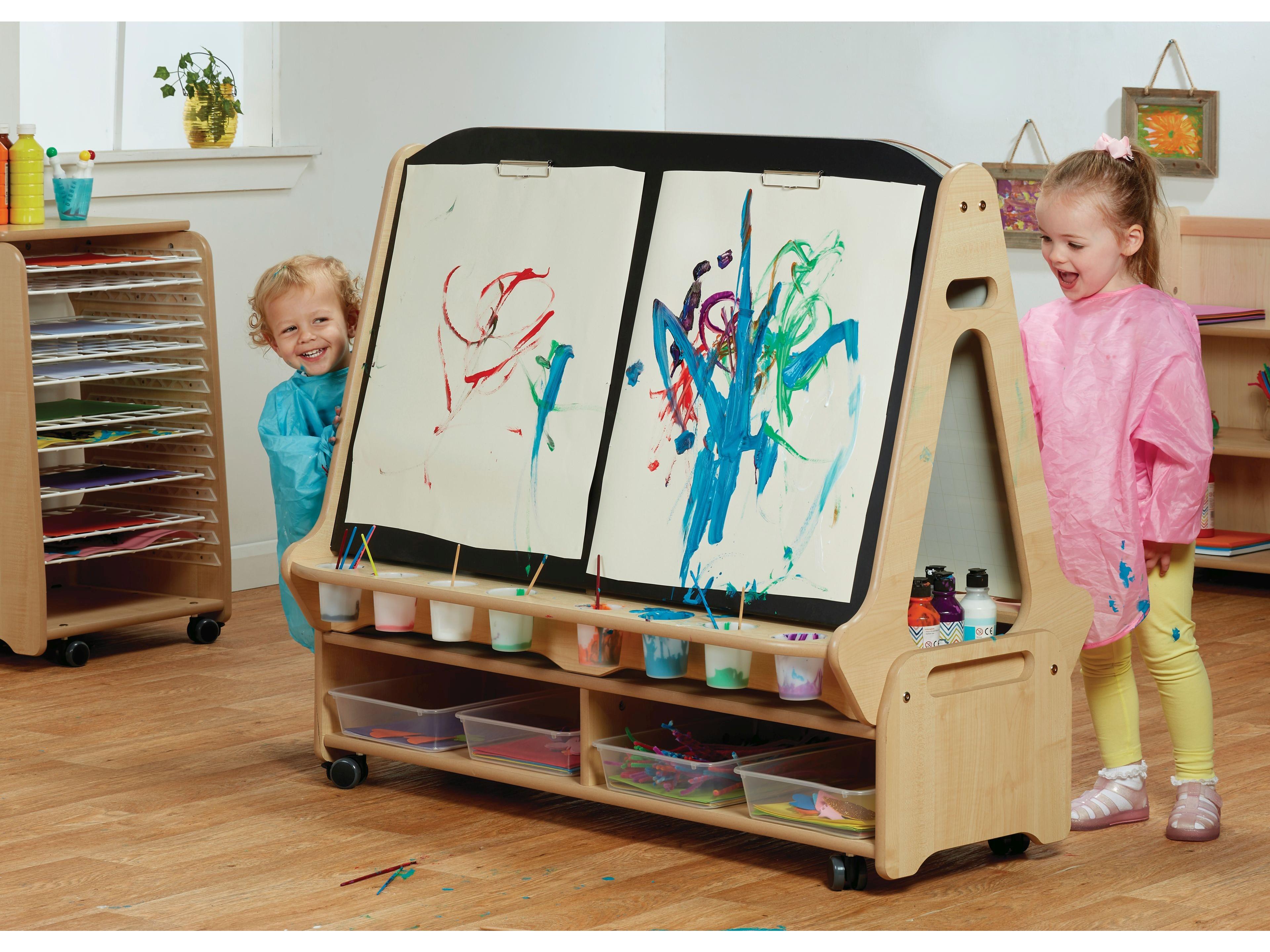 millhouse double sided easel with two chalkboards on one side and two whiteboards on the other