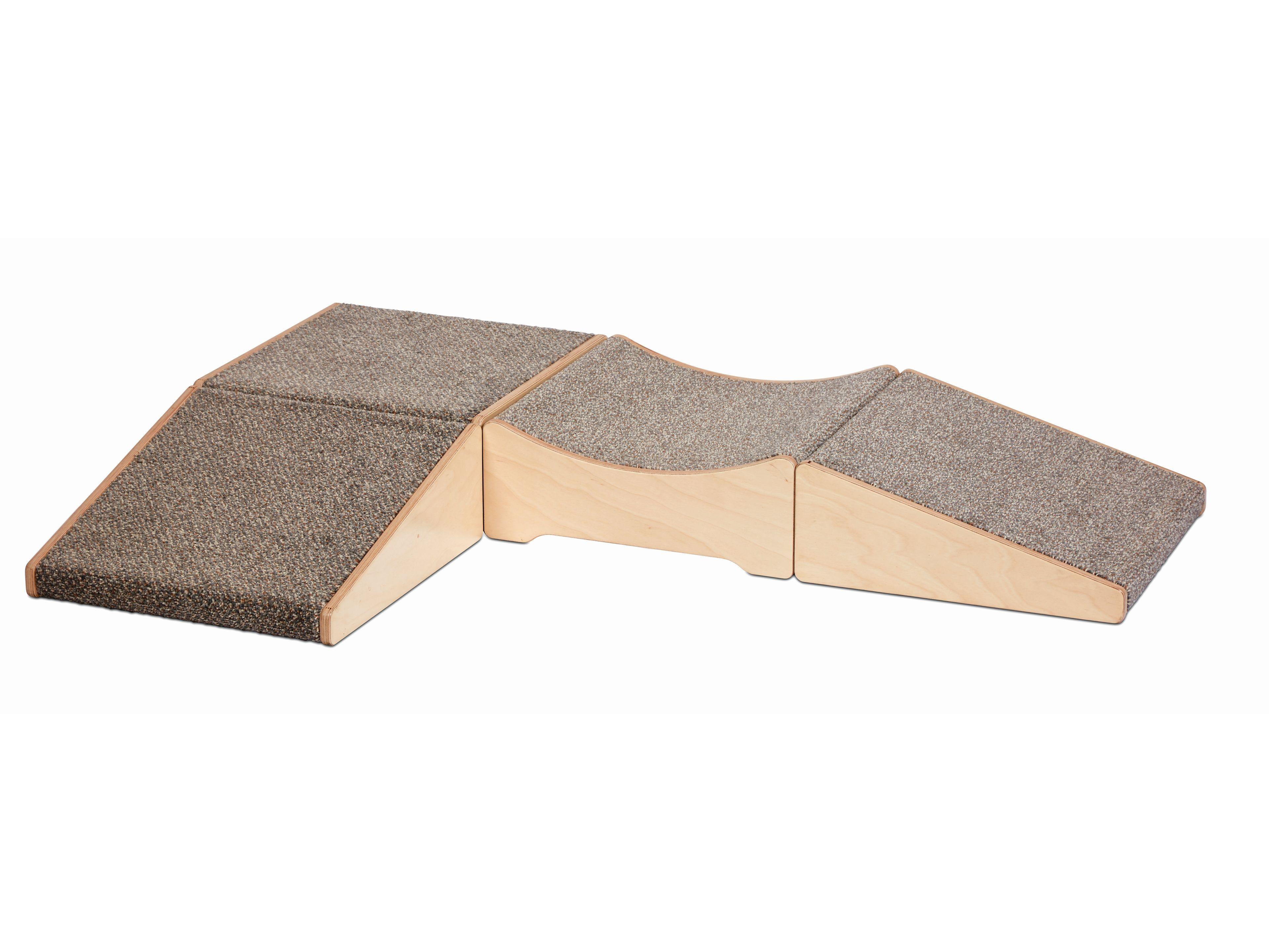 millhouse carpeted soft play unit with slide either side and challenging for babies