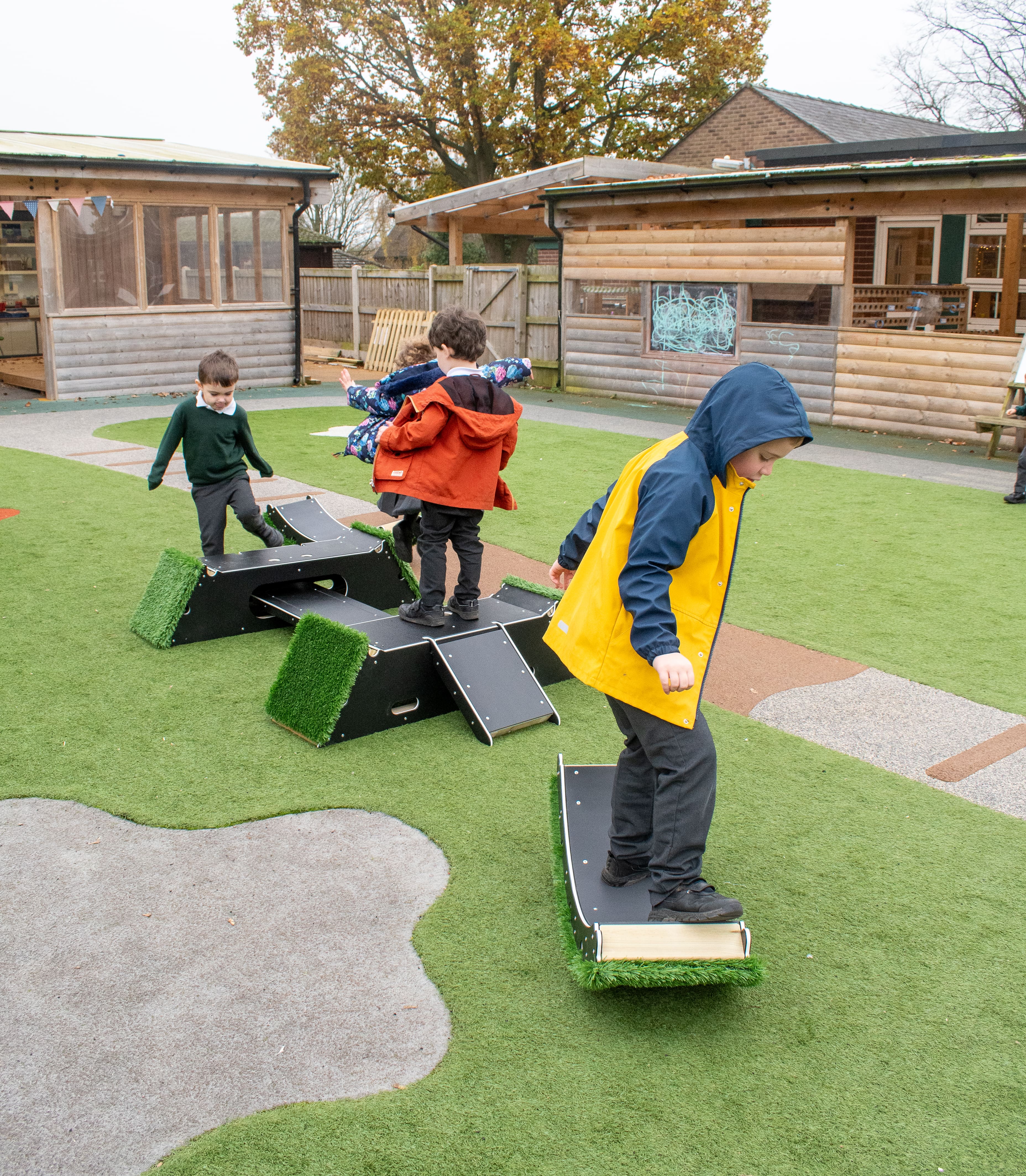 Children rocking and balancing on The Rockies, which is part of the Sports Premium Fundamental Balance and Coordination Package