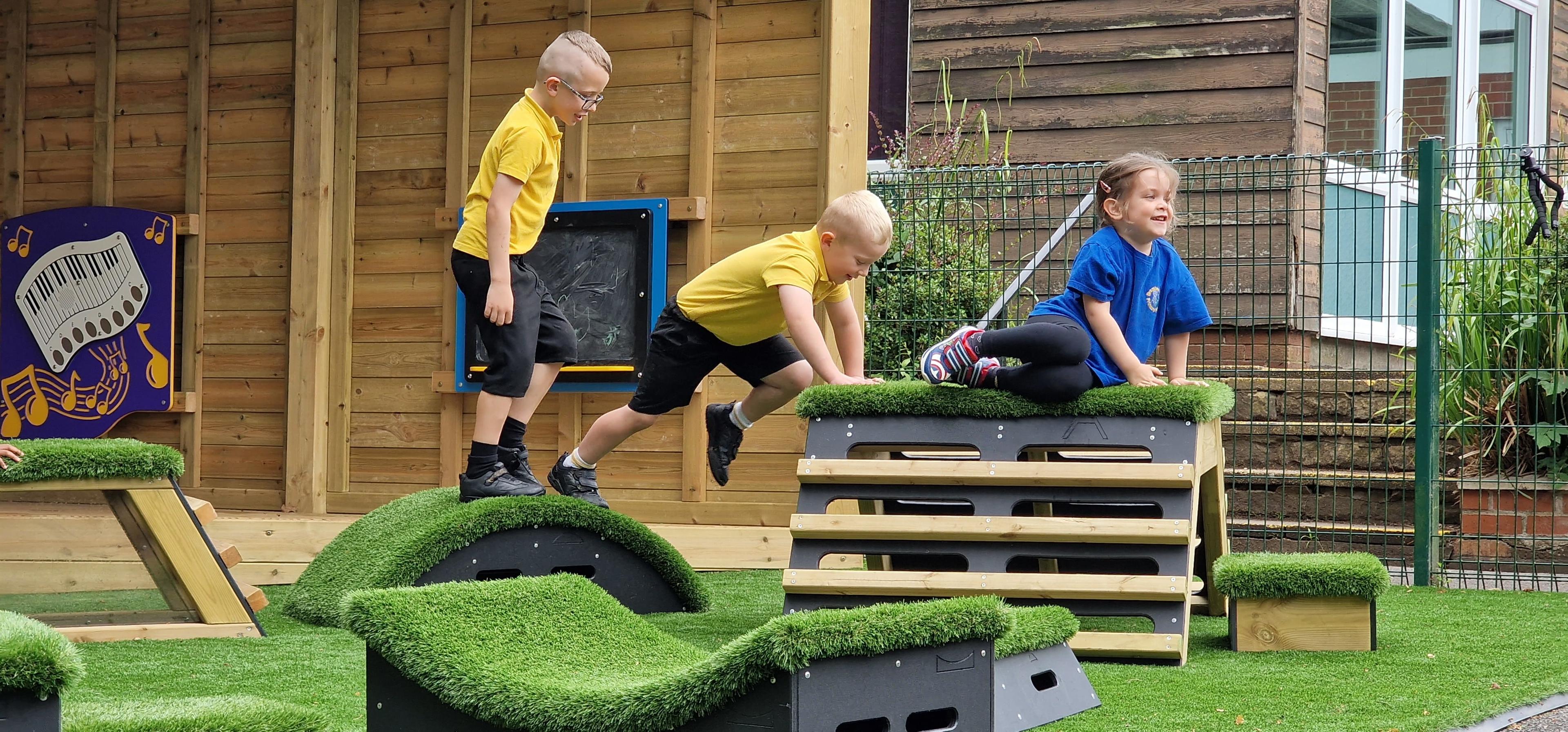 Children jumping over Get Set, Go! blocks which make up part of the Sports Premium Ultimate Balance and Coordination Package