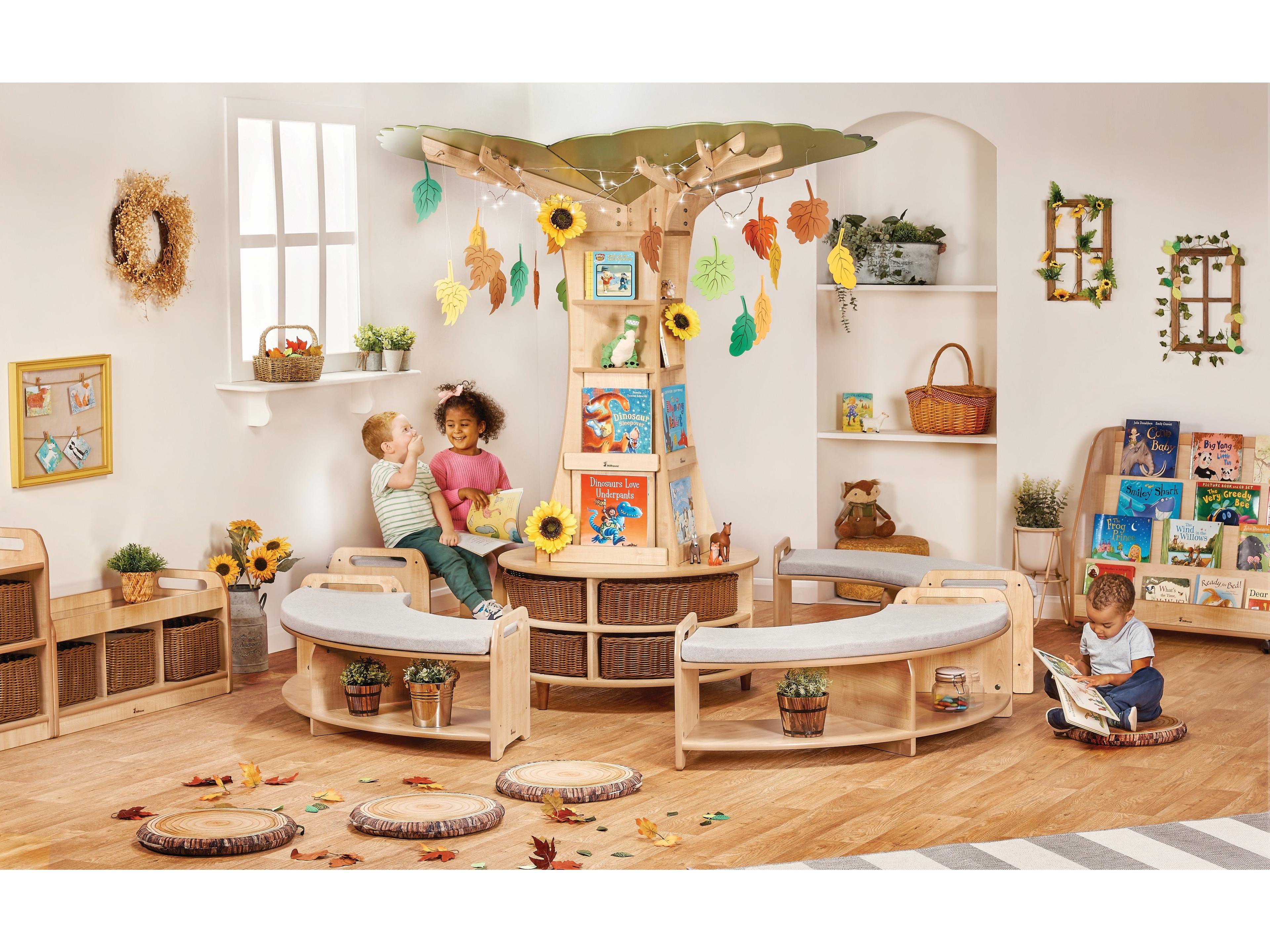 millhouse large wooden tree storing books and creating a reading area