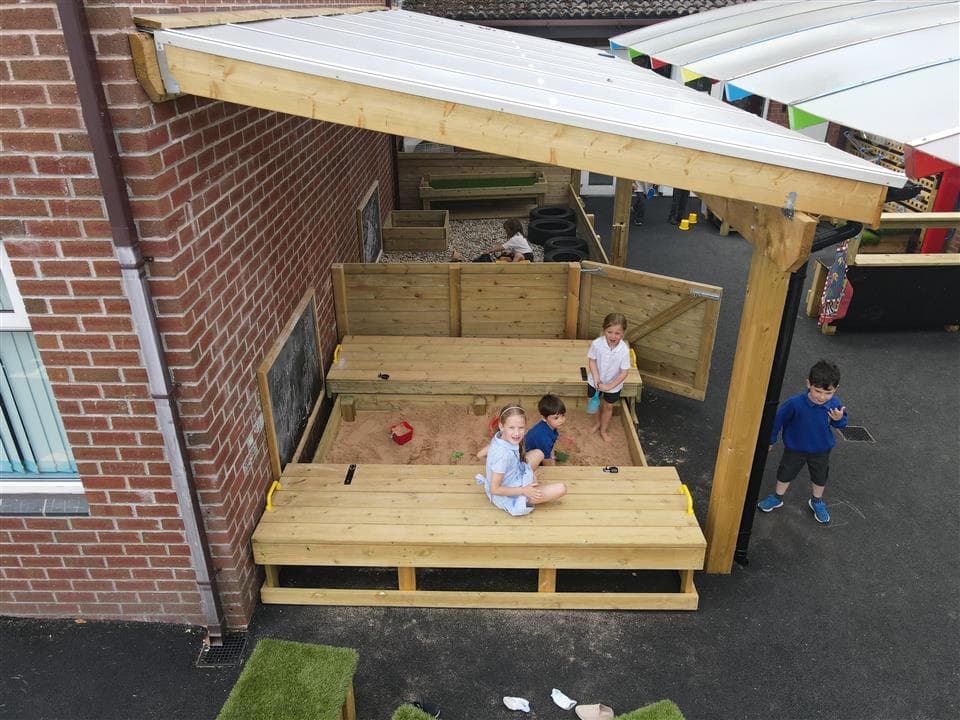 children playing in our large sand box