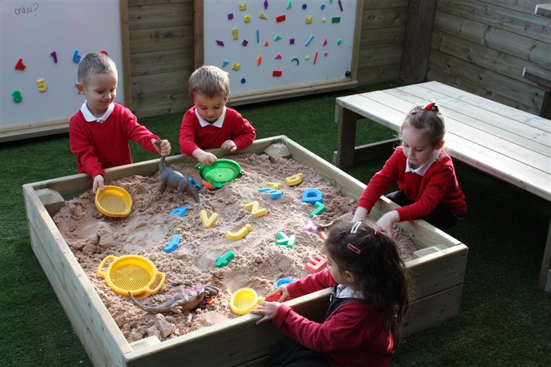 Sensory Play fun with our covered sand box