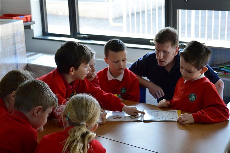 James discussing new playground plans with West Town Lane Academy