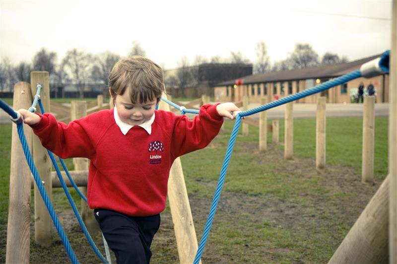 Inclusive outdoor balance beams for deaf children