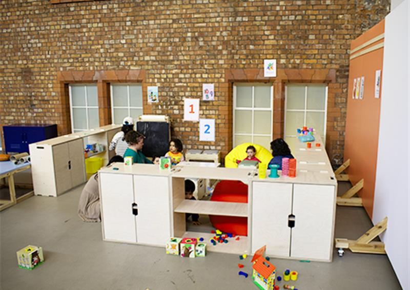 School children and teachers in Learning Breakout Space