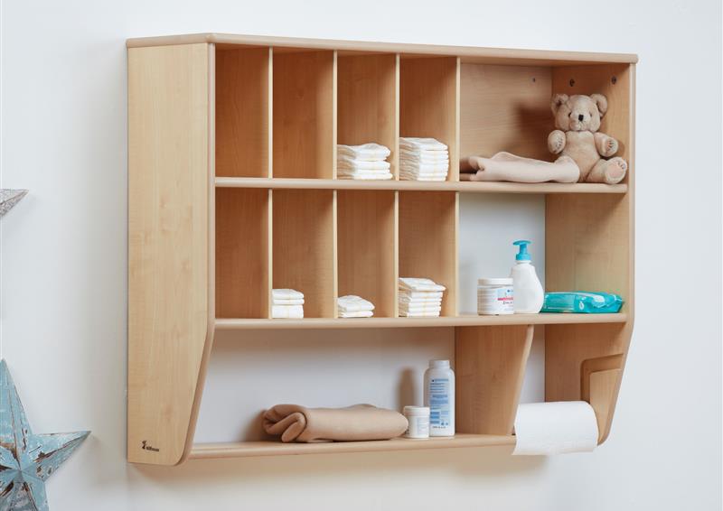 The Baby Changing Wall Storage Unit has various items stored on it. 