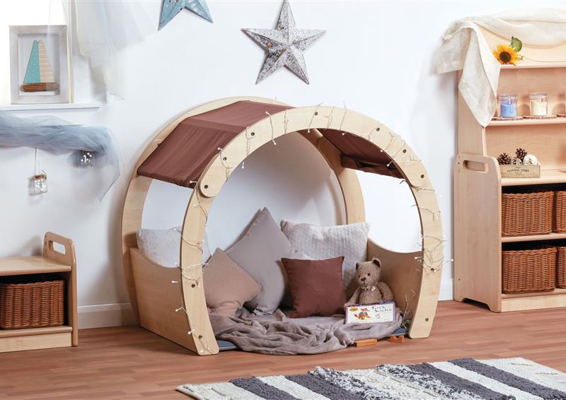 A small wooden Cosy Cove arch in a classroom setting.