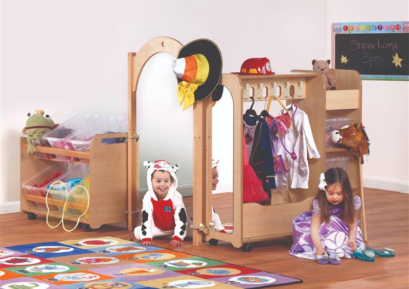 Two Pre-school aged children are playing dress up in the Mini Preschool Dressing-Up Zone