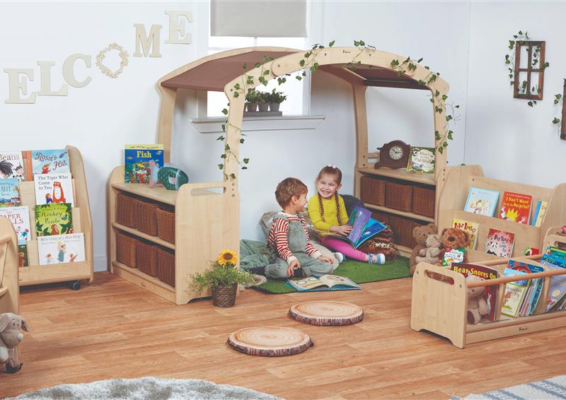 A young boy and girl are reading books inside the Cosy Reading Zone - Taupe roof without baskets.